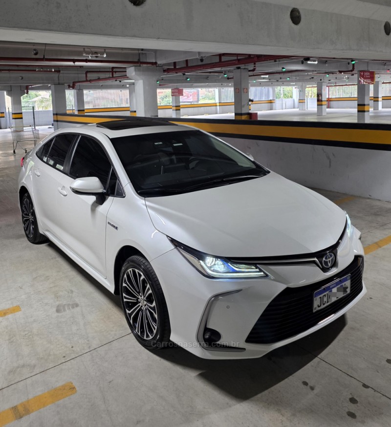 corolla 1.8 altis premium 16v hibrido 4p automatico 2023 caxias do sul
