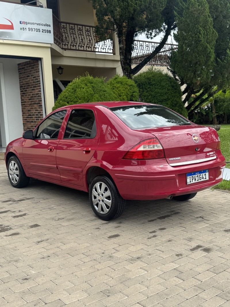 PRISMA 1.4 MPFI MAXX 8V FLEX 4P MANUAL - 2010 - ENCANTADO