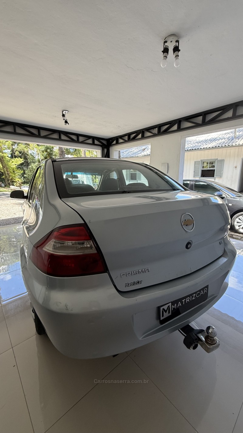 PRISMA 1.0 MPFI VHCE MAXX 8V FLEX 4P MANUAL - 2010 - CANELA