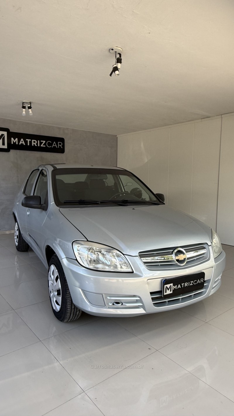 PRISMA 1.0 MPFI VHCE MAXX 8V FLEX 4P MANUAL - 2010 - CANELA