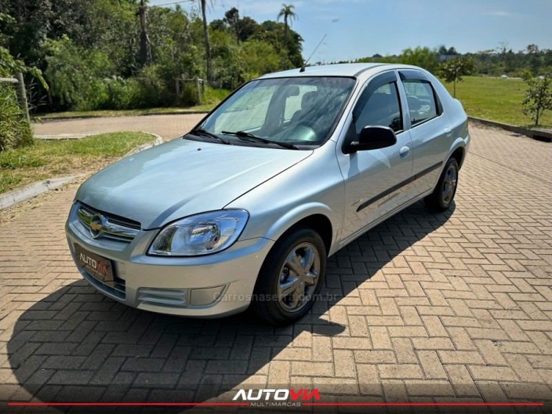 PRISMA 1.4 MPFI MAXX 8V FLEX 4P MANUAL - 2009 - SAPIRANGA