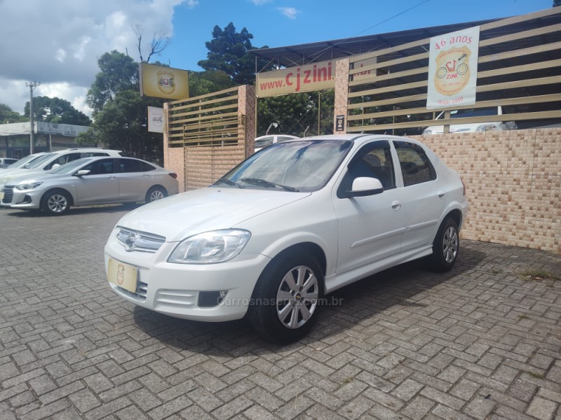 prisma 1.4 mpfi maxx 8v flex 4p manual 2010 canela