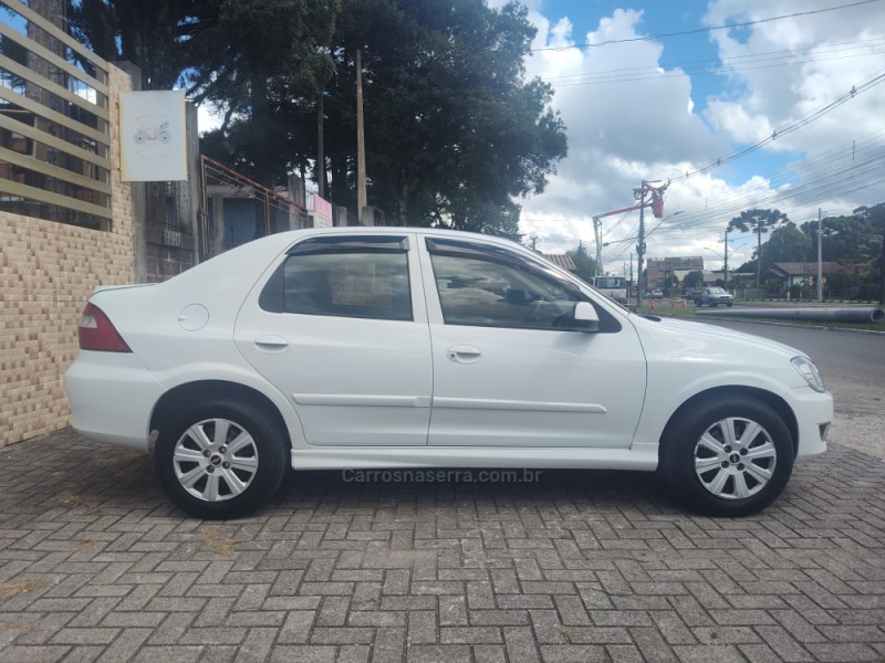 PRISMA 1.4 MPFI MAXX 8V FLEX 4P MANUAL - 2010 - CANELA