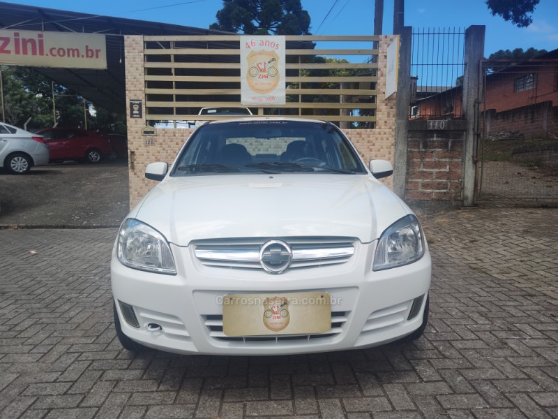 PRISMA 1.4 MPFI MAXX 8V FLEX 4P MANUAL - 2010 - CANELA