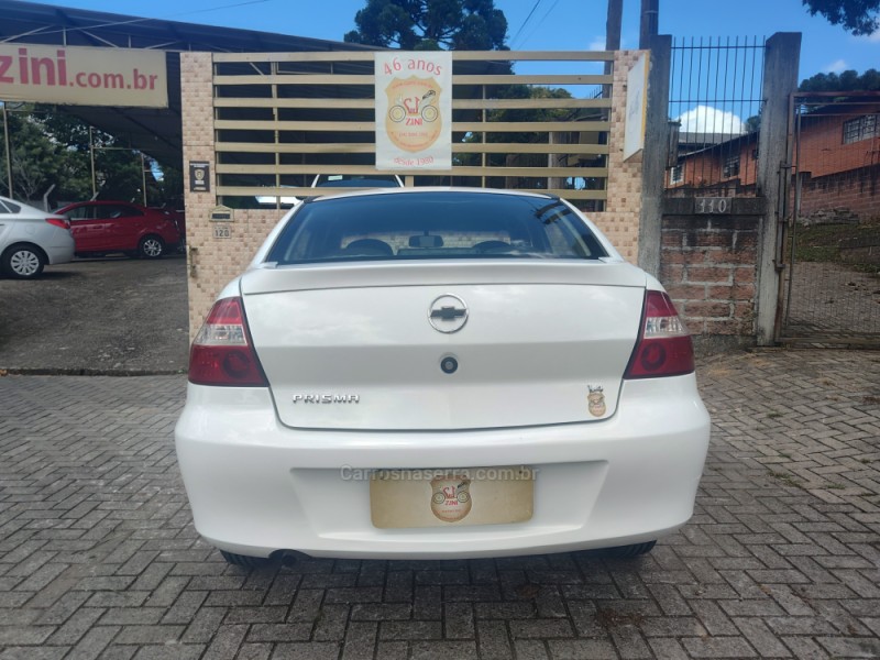 PRISMA 1.4 MPFI MAXX 8V FLEX 4P MANUAL - 2010 - CANELA