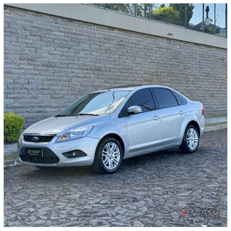 focus 2.0 ghia sedan 16v flex 4p automatico 2010 campo bom