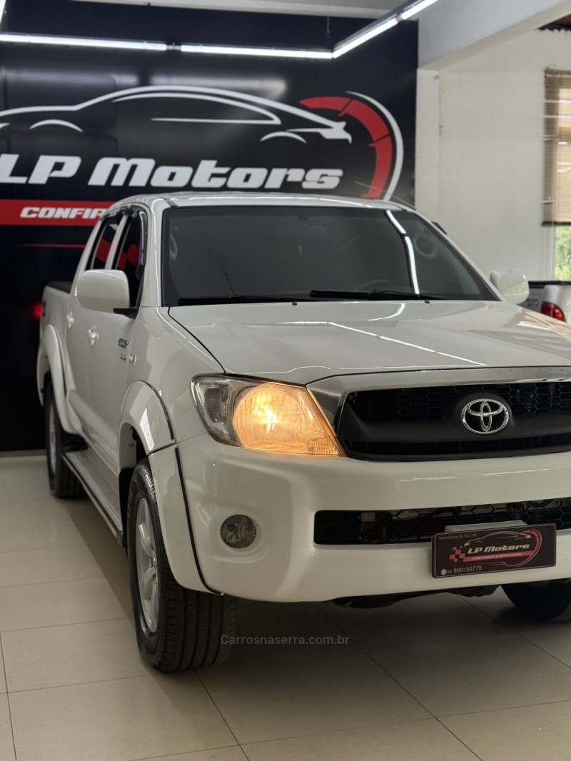 HILUX 2.5 4X4 CD 16V TURBO DIESEL 4P MANUAL - 2011 - FARROUPILHA