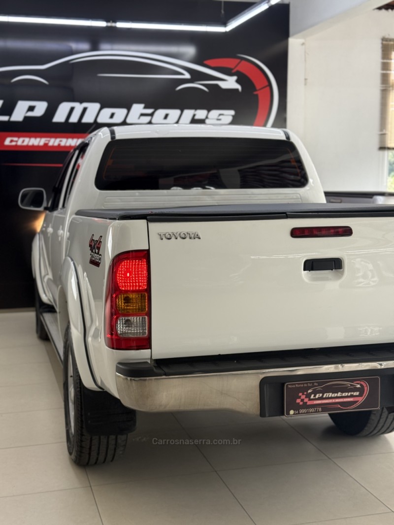 HILUX 2.5 4X4 CD 16V TURBO DIESEL 4P MANUAL - 2011 - FARROUPILHA