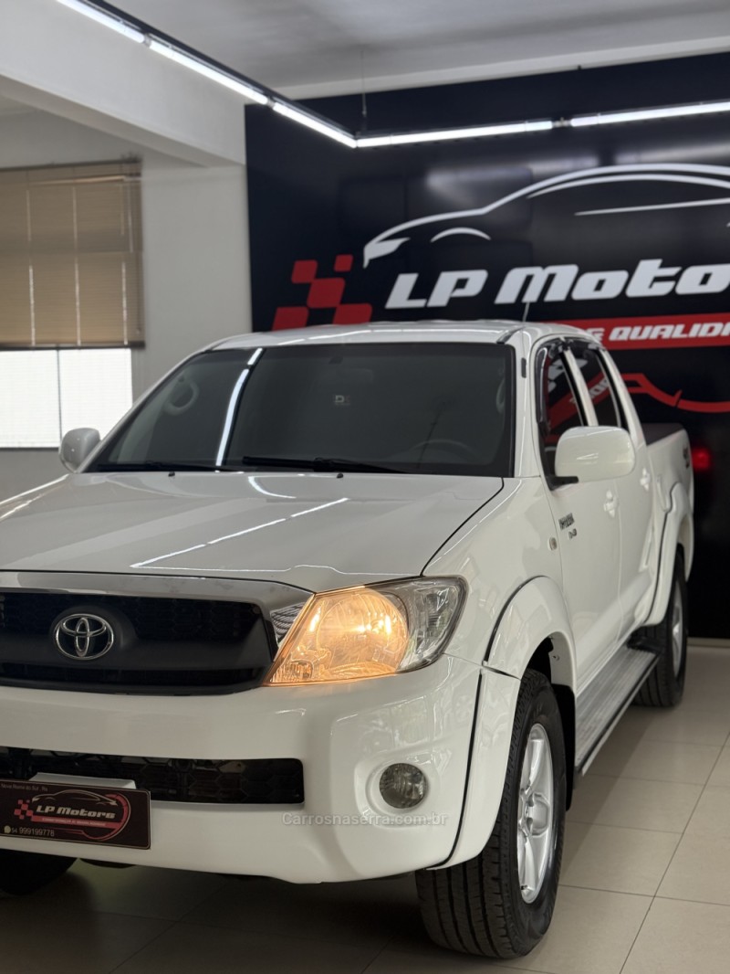 HILUX 2.5 4X4 CD 16V TURBO DIESEL 4P MANUAL - 2011 - FARROUPILHA