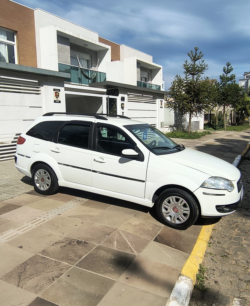 PALIO 1.4 MPI ATTRACTIVE WEEKEND 8V FLEX 4P MANUAL - 2009 - FARROUPILHA