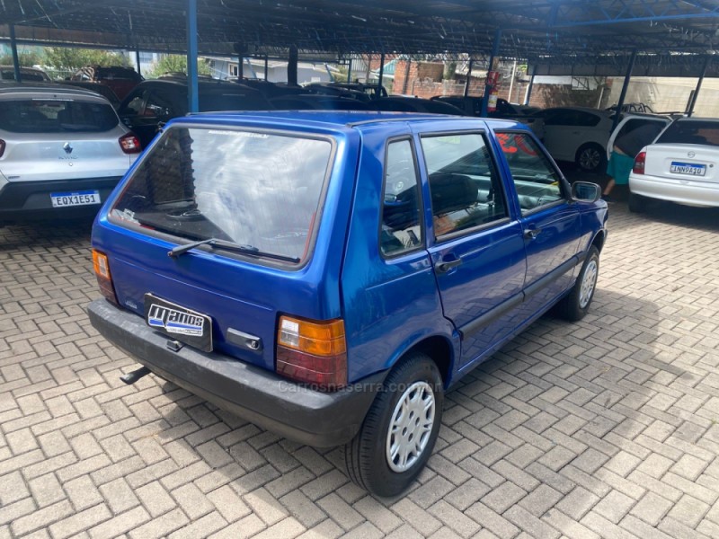 UNO 1.0 MPI MILLE FIRE 8V GASOLINA 4P MANUAL - 2003 - CANELA