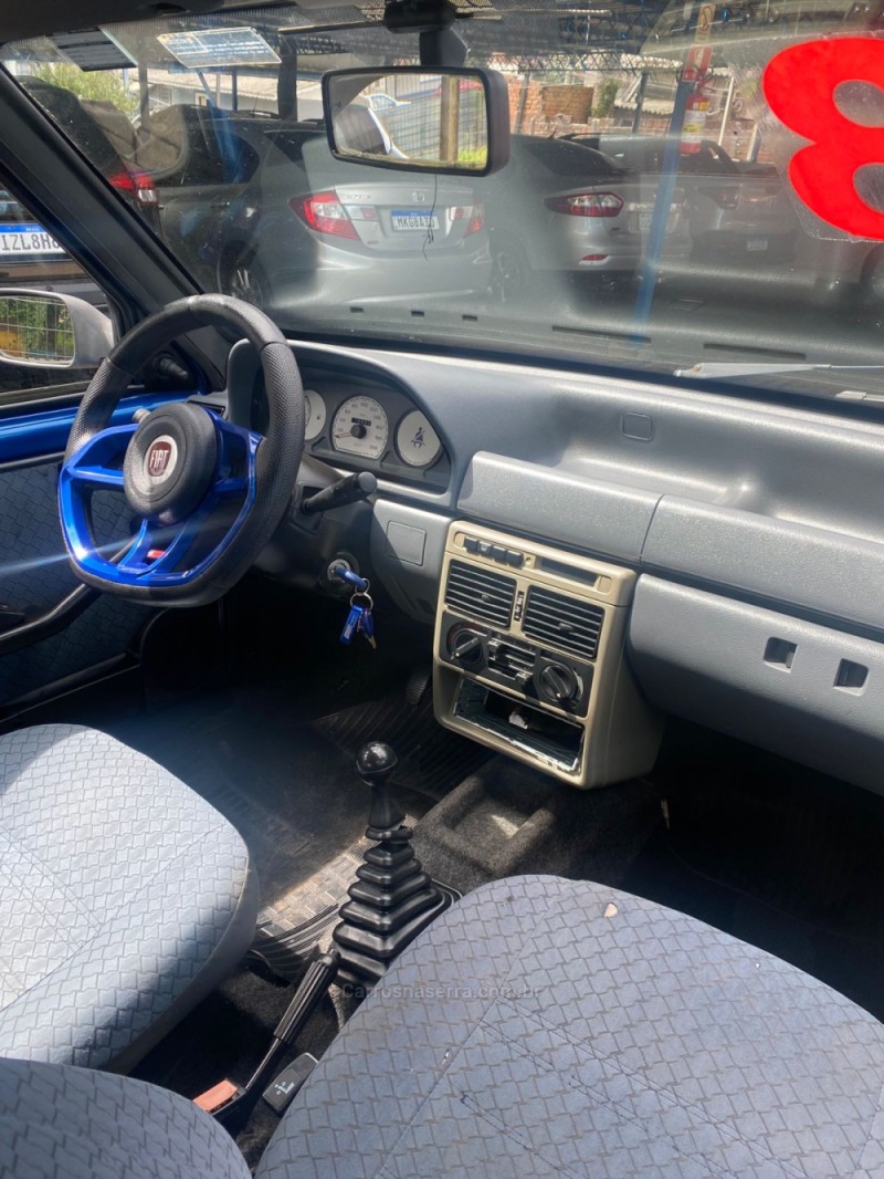 UNO 1.0 MPI MILLE FIRE 8V GASOLINA 4P MANUAL - 2003 - CANELA