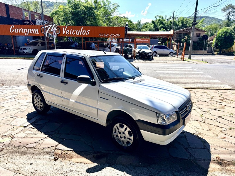 UNO 1.0 MPI MILLE FIRE ECONOMY 8V FLEX 4P MANUAL - 2013 - TRêS COROAS