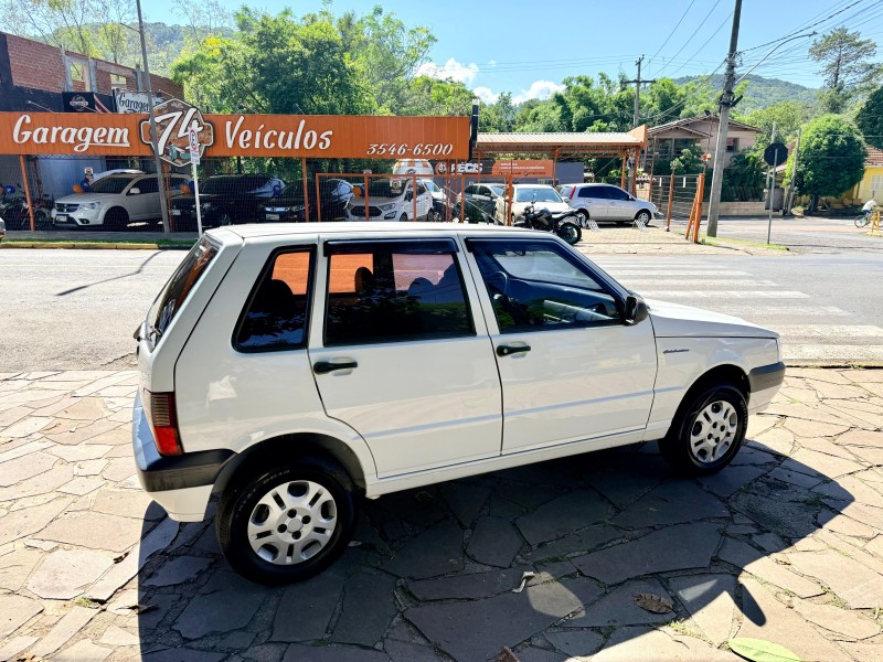 UNO 1.0 MPI MILLE FIRE ECONOMY 8V FLEX 4P MANUAL - 2013 - TRêS COROAS