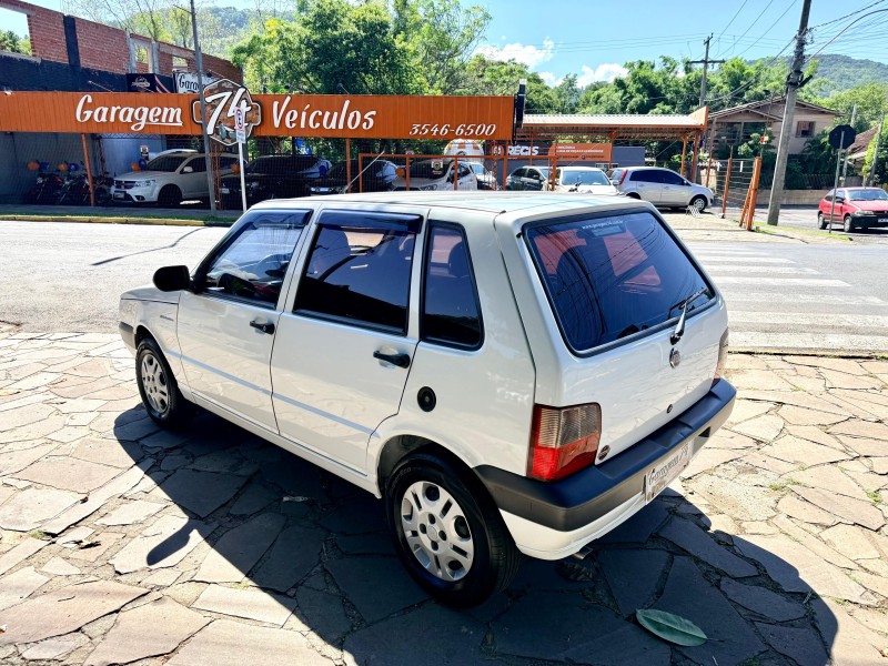 UNO 1.0 MPI MILLE FIRE ECONOMY 8V FLEX 4P MANUAL - 2013 - TRêS COROAS