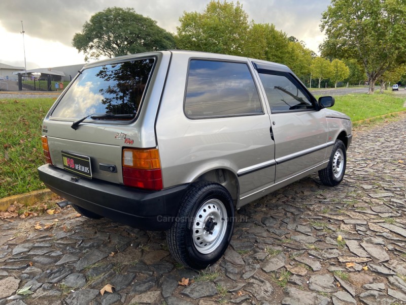 UNO 1.0 MPI MILLE FIRE 8V FLEX 2P MANUAL - 2002 - DOIS IRMãOS