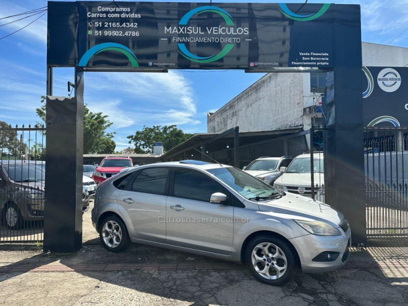 focus 2.0 titanium hatch 16v flex 4p automatico 2012 gravatai