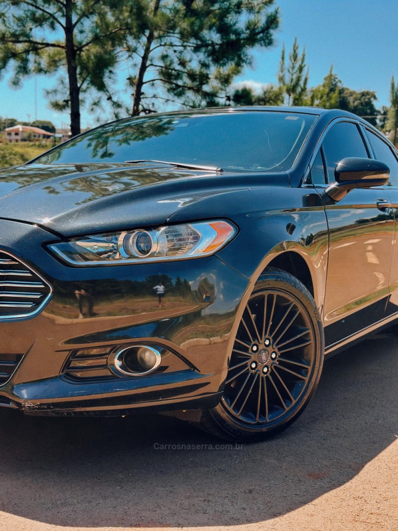 FUSION 2.0 TITANIUM AWD 16V GASOLINA 4P AUTOMÁTICO - 2013 - CAXIAS DO SUL