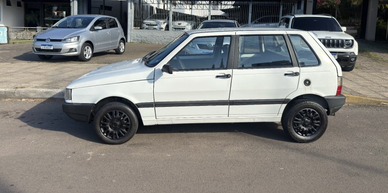 UNO 1.0 MPI MILLE SMART 8V GASOLINA 4P MANUAL - 2001 - FELIZ