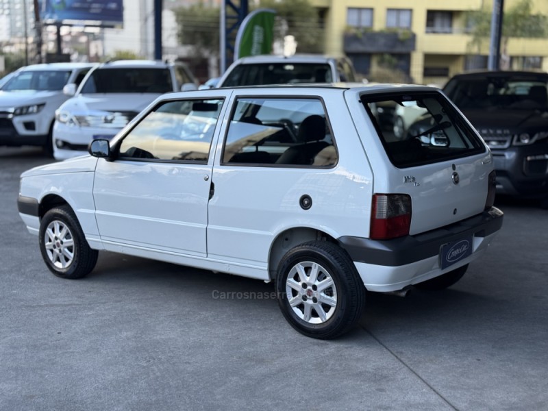 UNO 1.0 MPI MILLE FIRE ECONOMY 8V FLEX 2P MANUAL - 2013 - CAXIAS DO SUL