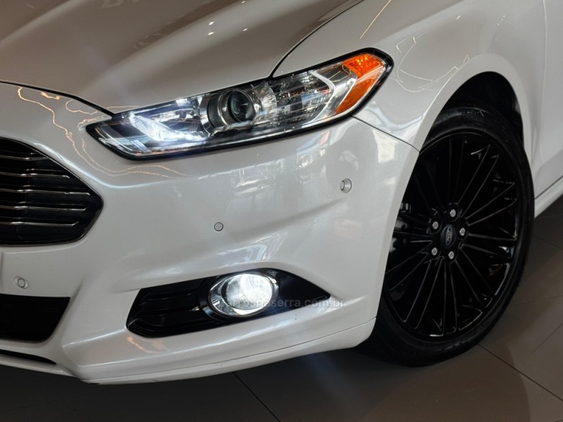 FUSION 2.0 TITANIUM AWD 16V GASOLINA 4P AUTOMÁTICO - 2014 - DOIS IRMãOS