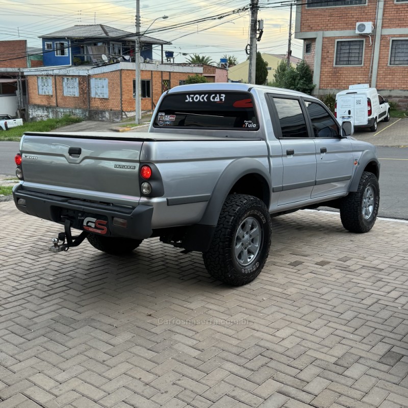 L200 OUTDOOR 2.5 HPE 4X4 CD 8V TURBO INTERCOOLER DIESEL 4P MANUAL - 2011 - NOVO HAMBURGO