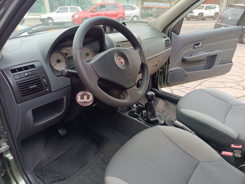 STRADA 1.8 MPI ADVENTURE LOCKER CE 8V FLEX 2P MANUAL - 2012 - FLORES DA CUNHA