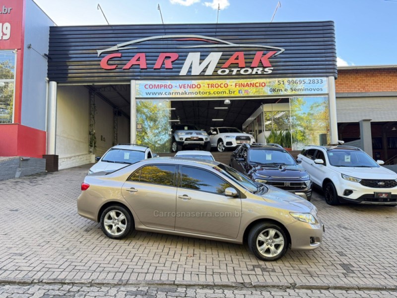 corolla 1.8 xei 16v flex 4p automatico 2009 dois irmaos