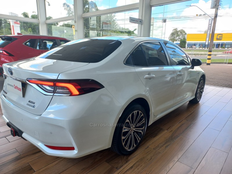 COROLLA 1.8 ALTIS PREMIUM 16V HÍBRIDO 4P AUTOMÁTICO - 2023 - TAQUARA