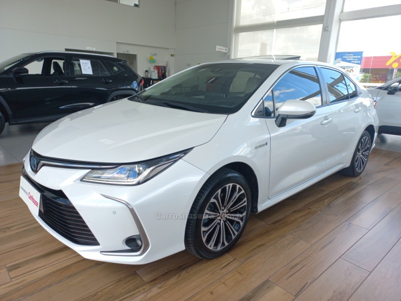 corolla 1.8 altis premium 16v hibrido 4p automatico 2023 taquara