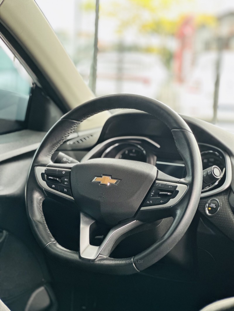 ONIX 1.0	LTZ PLUS 8V TURBO FLEX 4P AUTOMÁTICO - 2024 - CANELA