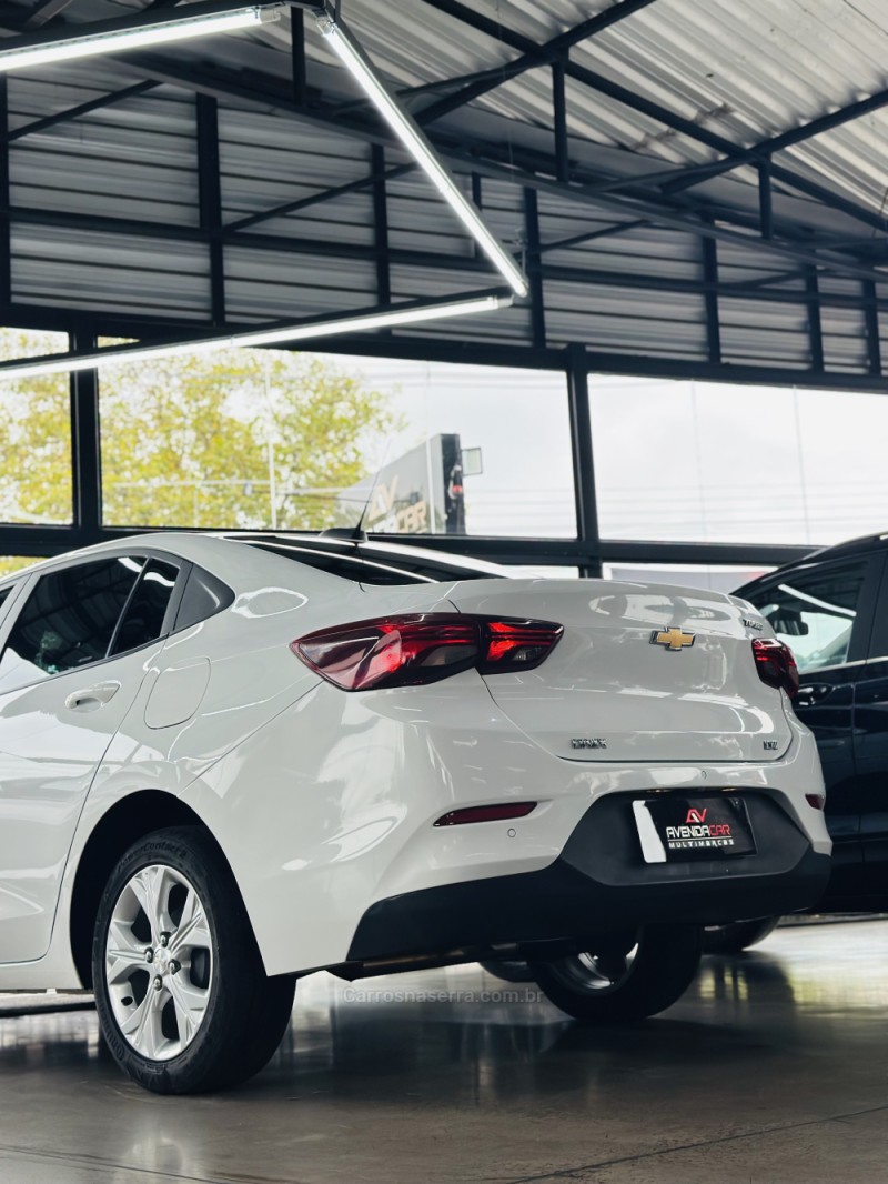 ONIX 1.0	LTZ PLUS 8V TURBO FLEX 4P AUTOMÁTICO - 2024 - CANELA