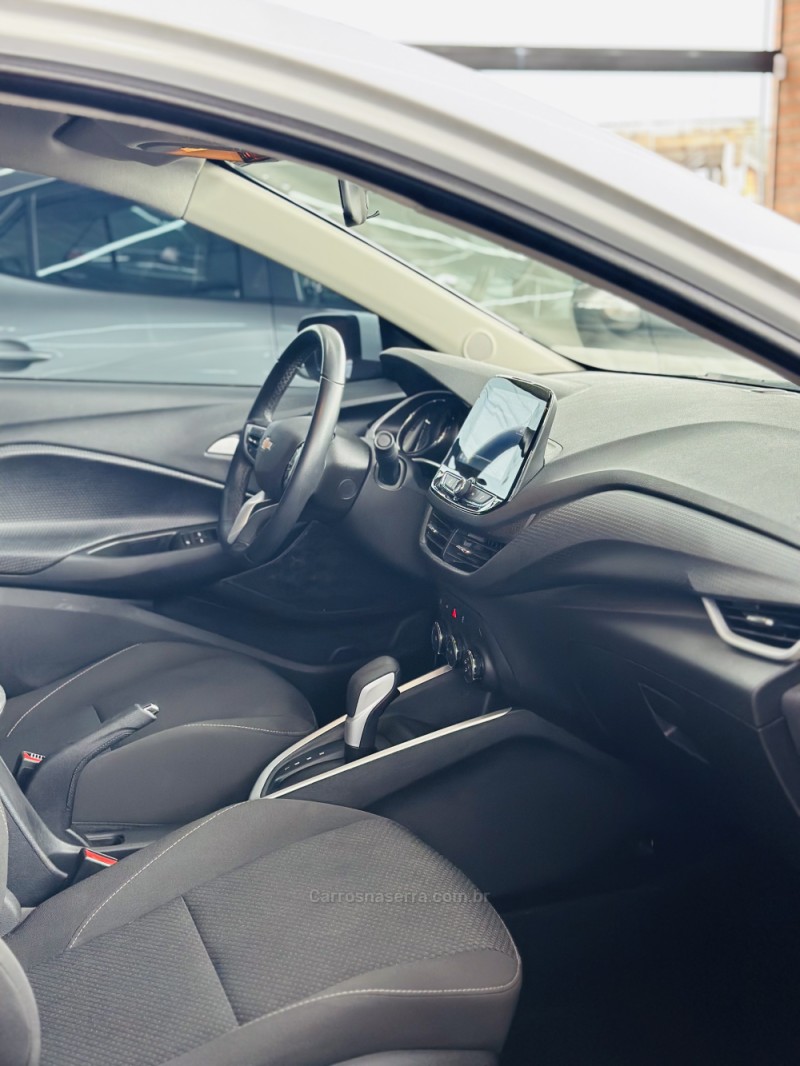 ONIX 1.0	LTZ PLUS 8V TURBO FLEX 4P AUTOMÁTICO - 2024 - CANELA