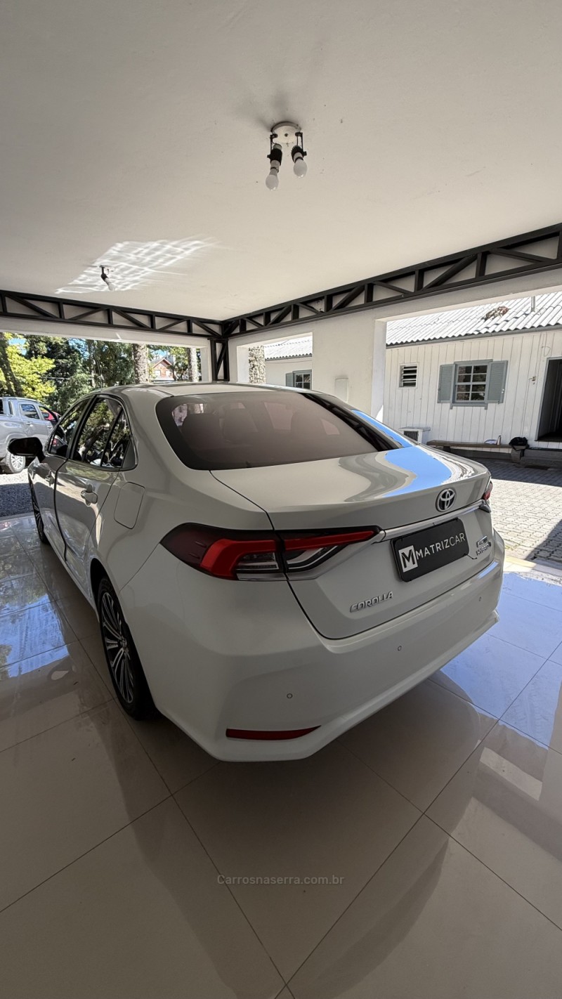 COROLLA 1.8 ALTIS PREMIUM 16V HÍBRIDO 4P AUTOMÁTICO - 2023 - CANELA