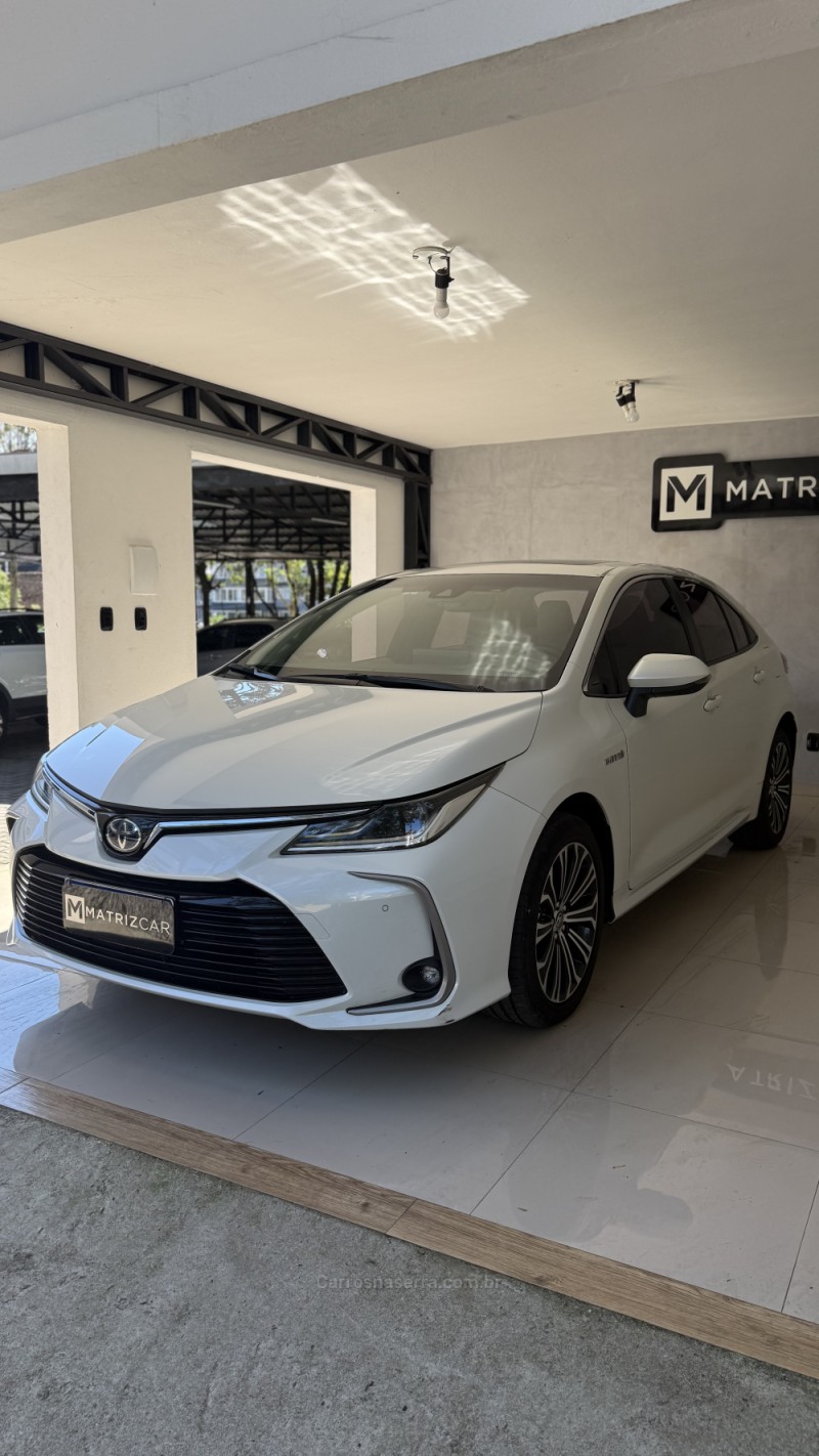 COROLLA 1.8 ALTIS PREMIUM 16V HÍBRIDO 4P AUTOMÁTICO - 2023 - CANELA