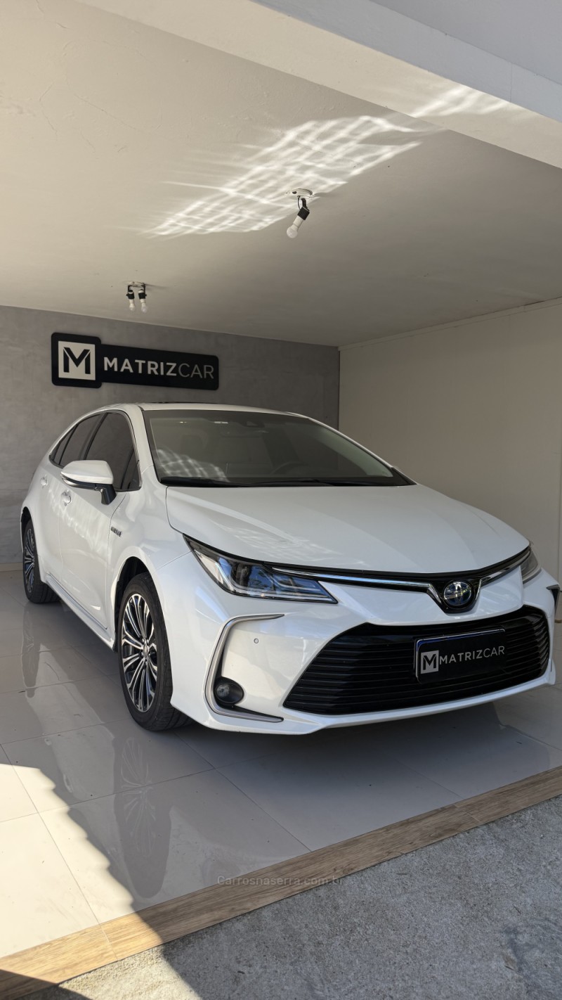 COROLLA 1.8 ALTIS PREMIUM 16V HÍBRIDO 4P AUTOMÁTICO - 2023 - CANELA