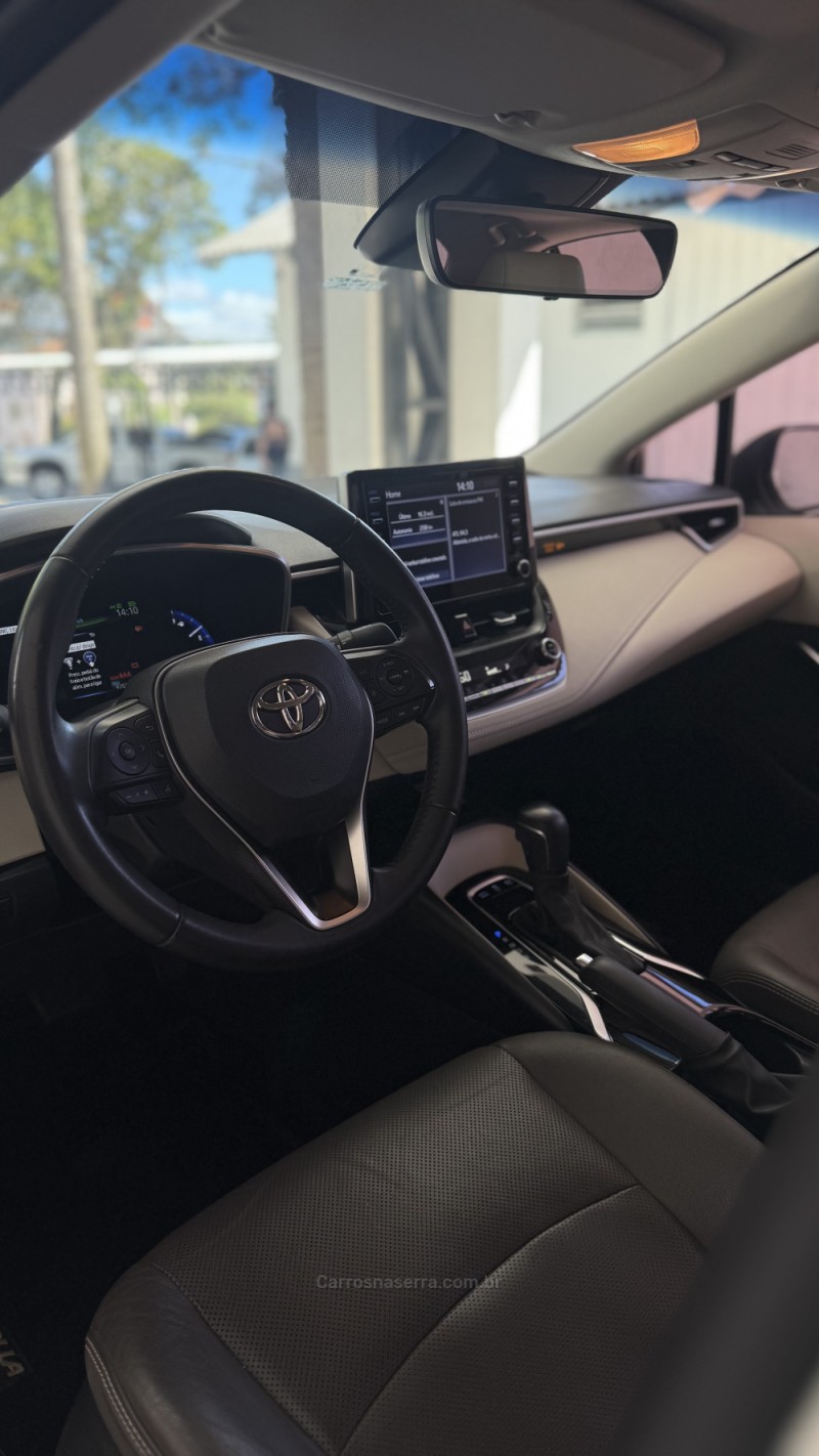 COROLLA 1.8 ALTIS PREMIUM 16V HÍBRIDO 4P AUTOMÁTICO - 2023 - CANELA