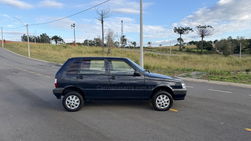 UNO 1.0 MPI MILLE FIRE ECONOMY 8V FLEX 4P MANUAL - 2011 - VILA FLORES