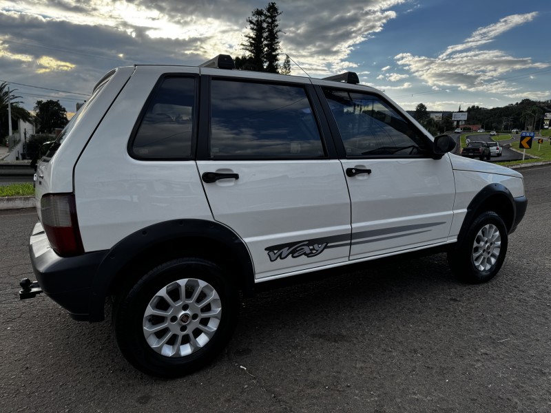 UNO 1.0 MPI MILLE FIRE ECONOMY 8V FLEX 4P MANUAL - 2011 - DOIS IRMãOS