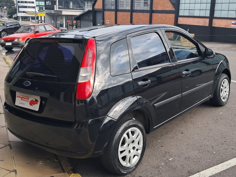 FIESTA 1.0 MPI PERSONNALITÉ 8V FLEX 4P MANUAL - 2004 - FLORES DA CUNHA