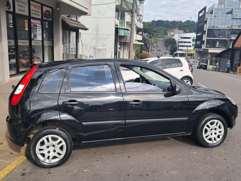 FIESTA 1.0 MPI PERSONNALITÉ 8V FLEX 4P MANUAL - 2004 - FLORES DA CUNHA