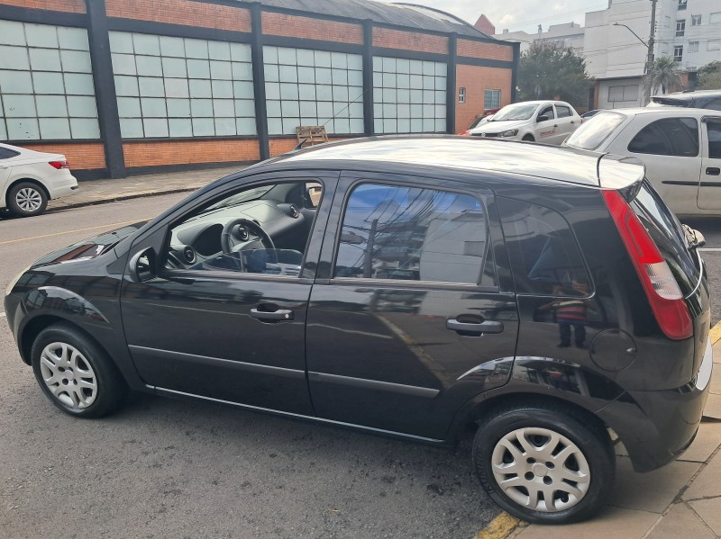 FIESTA 1.0 MPI PERSONNALITÉ 8V FLEX 4P MANUAL - 2004 - FLORES DA CUNHA