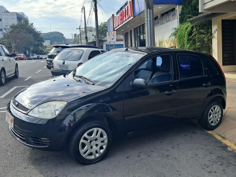 FIESTA 1.0 MPI PERSONNALITÉ 8V FLEX 4P MANUAL - 2004 - FLORES DA CUNHA