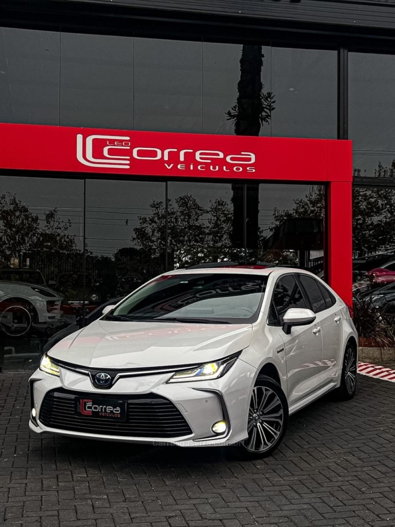 COROLLA 1.8 ALTIS PREMIUM 16V HÍBRIDO 4P AUTOMÁTICO - 2023 - CANELA