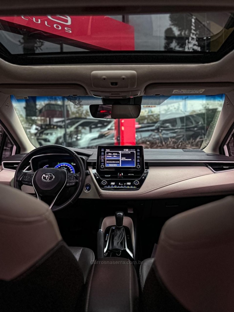 COROLLA 1.8 ALTIS PREMIUM 16V HÍBRIDO 4P AUTOMÁTICO - 2023 - CANELA