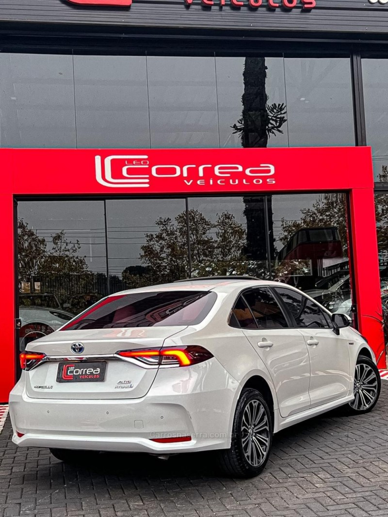 COROLLA 1.8 ALTIS PREMIUM 16V HÍBRIDO 4P AUTOMÁTICO - 2023 - CANELA