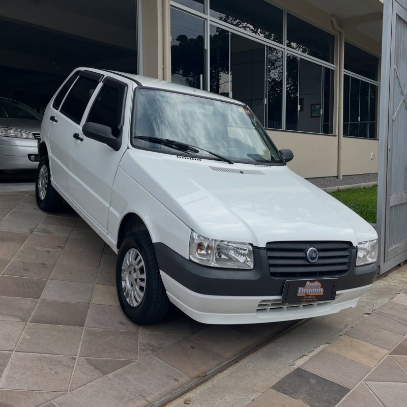 UNO 1.0 MPI MILLE FIRE ECONOMY 8V FLEX 4P MANUAL - 2011 - NOVA PETRóPOLIS