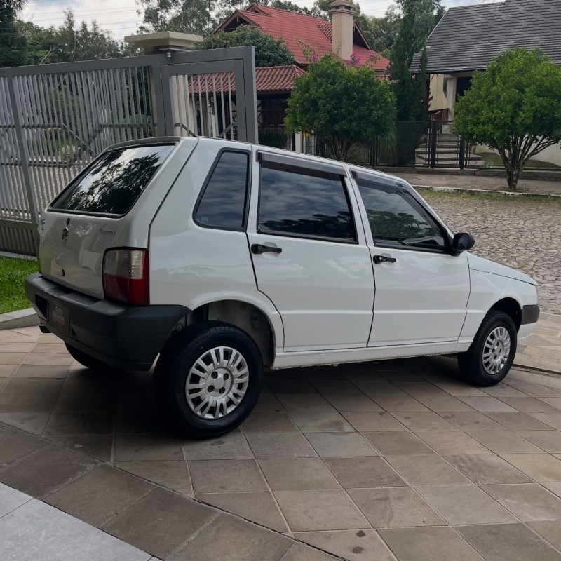UNO 1.0 MPI MILLE FIRE ECONOMY 8V FLEX 4P MANUAL - 2011 - NOVA PETRóPOLIS