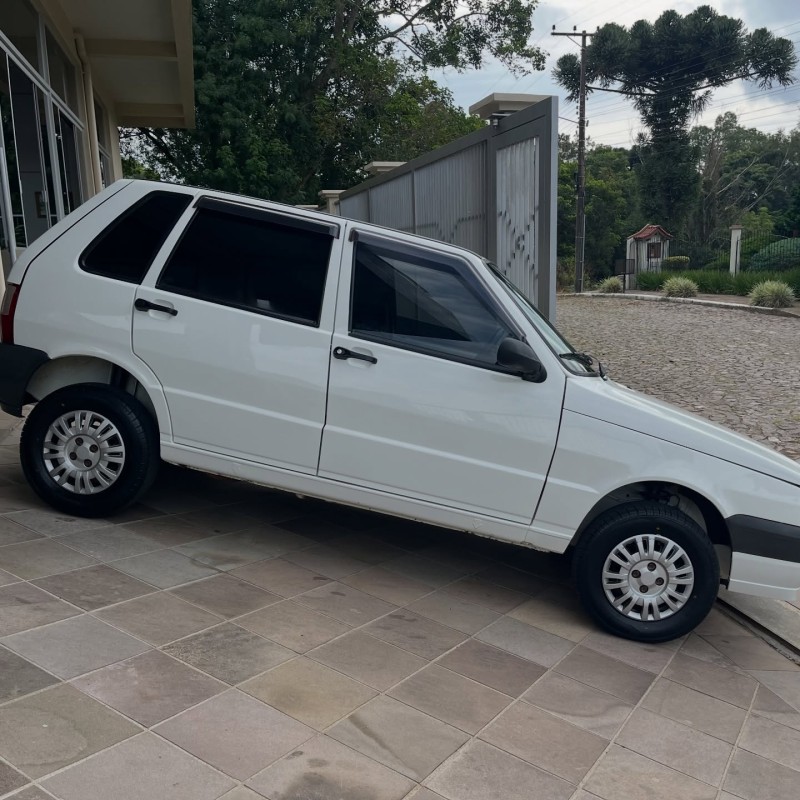 UNO 1.0 MPI MILLE FIRE ECONOMY 8V FLEX 4P MANUAL - 2011 - NOVA PETRóPOLIS