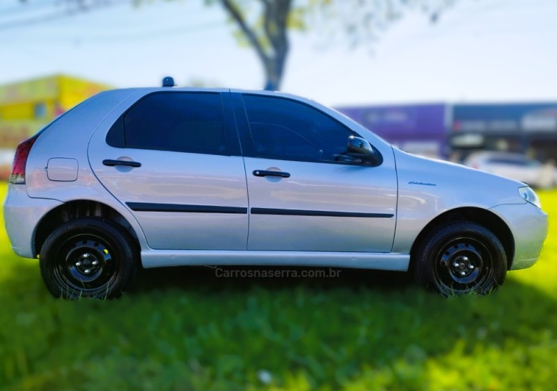 PALIO 1.0 MPI FIRE CELEBRATION ECONOMY 8V FLEX 4P MANUAL - 2009 - NOVO HAMBURGO
